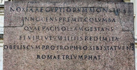 One of the four inscriptions at the base (east face) of the 'Agonalis' obelisk, Piazza Navona, Rome
