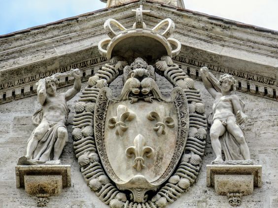 The coat of arms of France, the work of Niccolò Fiammingo, crowns the facade of the church of San Luigi dei Francesi, Rome
