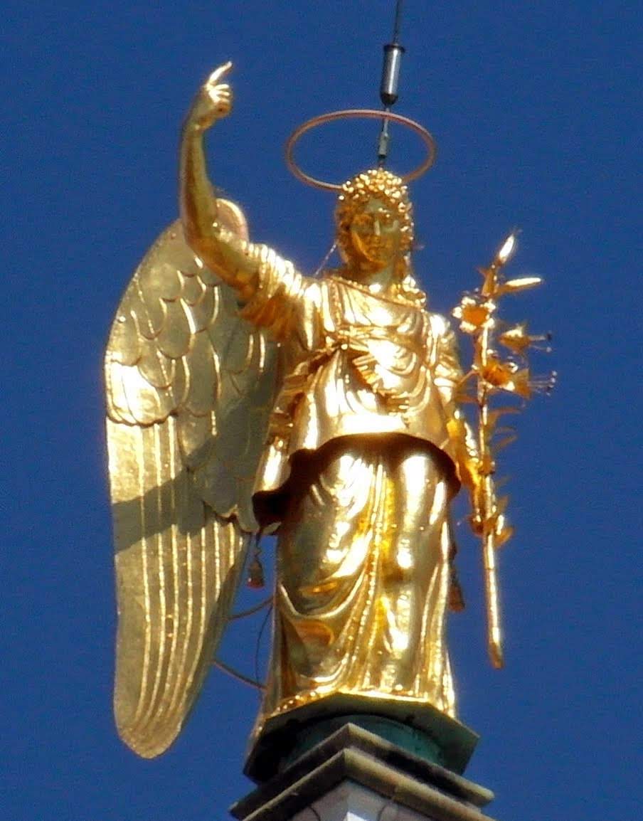 A Statue of the Archangel Gabriel crowns the bell tower in the Piazza San Marco in Venice