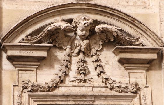 An angel on the facade of the church of Sant' Antonio dei Portoghesi, Rome