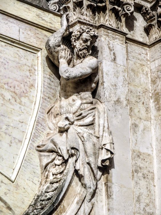 An atlantid (telamon) on the facade of the church of Sant' Antonio dei Portoghesi, Rome