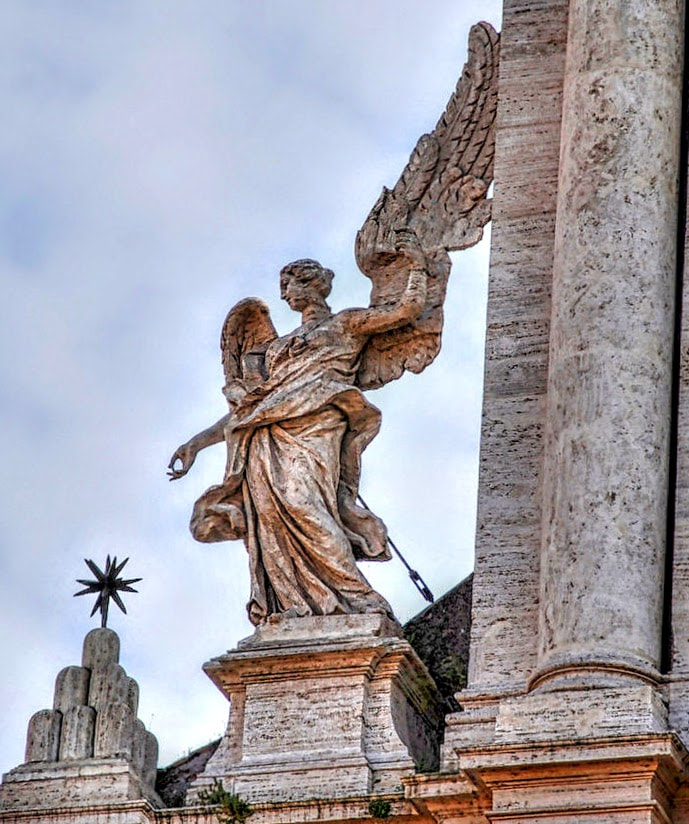 Angel by Ercole Ferrata, facade of Sant' Andrea della Valle, Rome