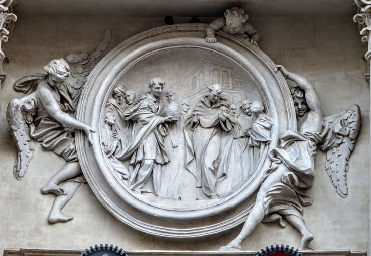 Bas-relief of 'St Philip Benizi Refusing the Tiara' by Antonio Raggi, facade of San Marcello al Corso, Rome.