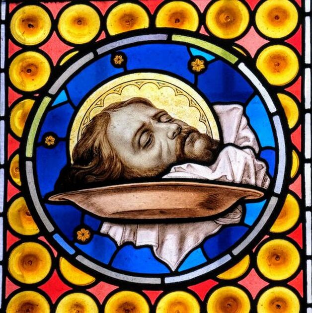 Head of St John the Baptist, stained glass window in the church of San Silvestro in Capite, Rome