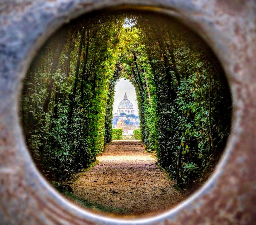 'Keyhole' view of the dome of St Peter's Basilica, Magistral Villa, Rome