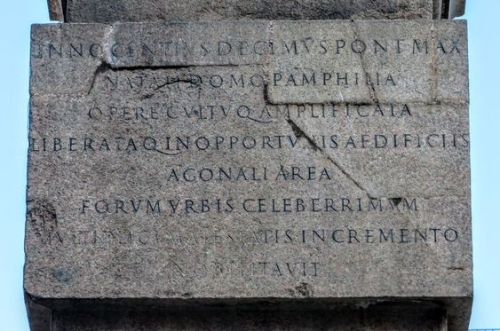 One of the four inscriptions at the base (west face) of the 'Agonalis' obelisk, Piazza Navona, Rome