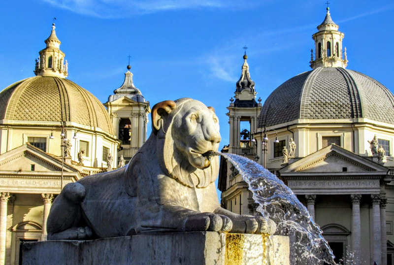 One of the four lions of the Fontana dei Leoni, Piazza del Popolo, Rome