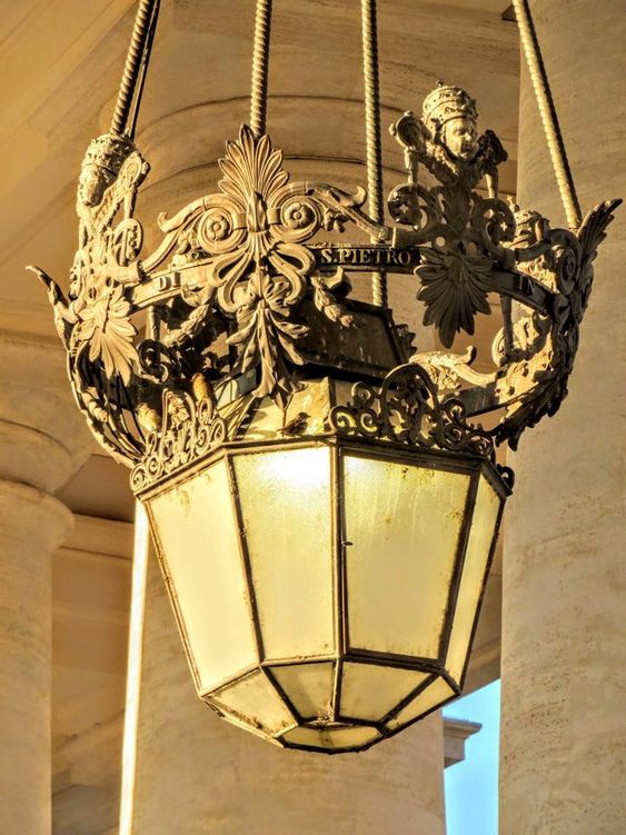 One of the lamps in the colonnades of St Peter's Square, Rome