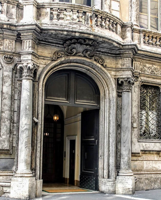 An entrance to the Palazzo Doria Pamphilj, Via del Corso, Rome