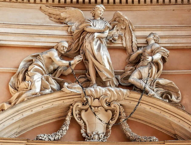 'Angel Freeing Two Captives' by Pietro Pacilli, facade of church of Santissima Trinità degli Spagnoli, Rome