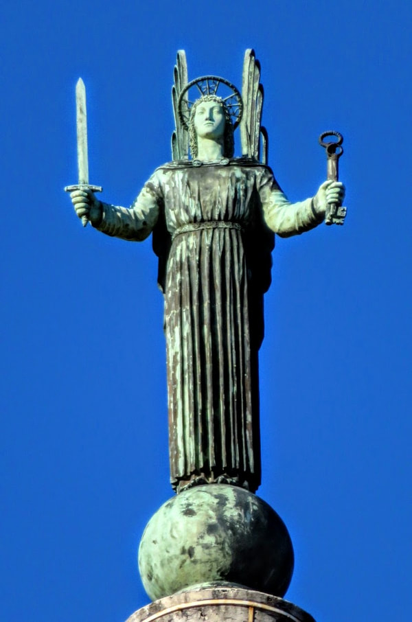 Bronze angel atop church of Santi Pietro e Paolo (St Peter and Paul), Rome