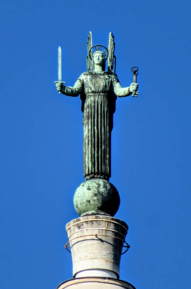 Bronze Angel atop hurch of Santi Pietro e Paolo a Via Ostienze, EUR, Rome