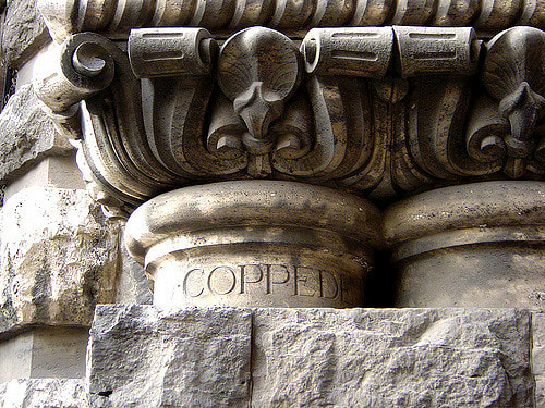 Name of the architect inscribed on the Arco degli Ambasciatori, Quartiere Coppede, Rome