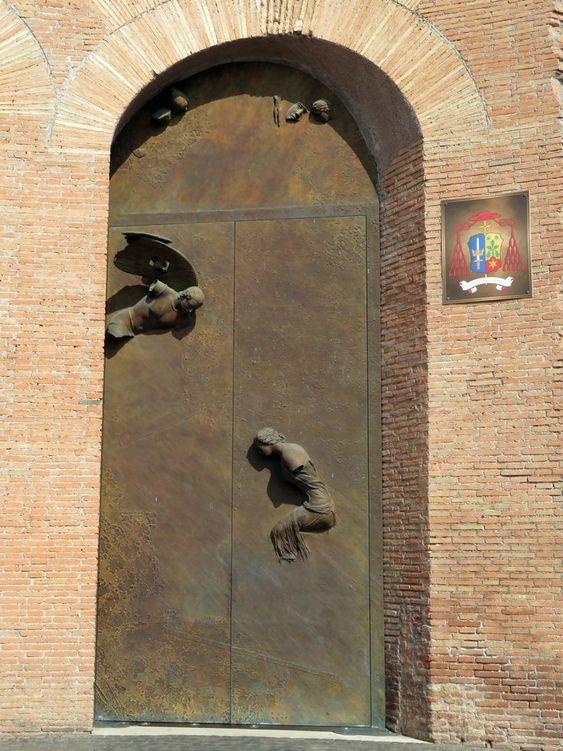 One of the two bronze doors by Igor Mitoraj, the church of Santa Maria degli Angeli, Rome