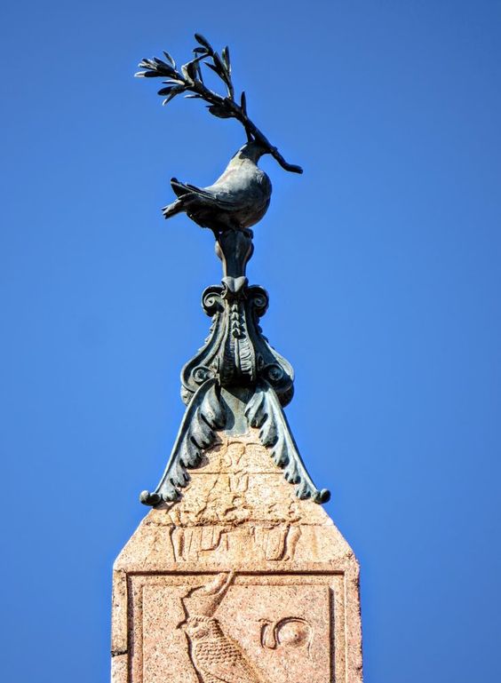 The heraldic dove of the Pamphilj family crowns the 'Agonalis' obelisk, Piazza Navona, Rome