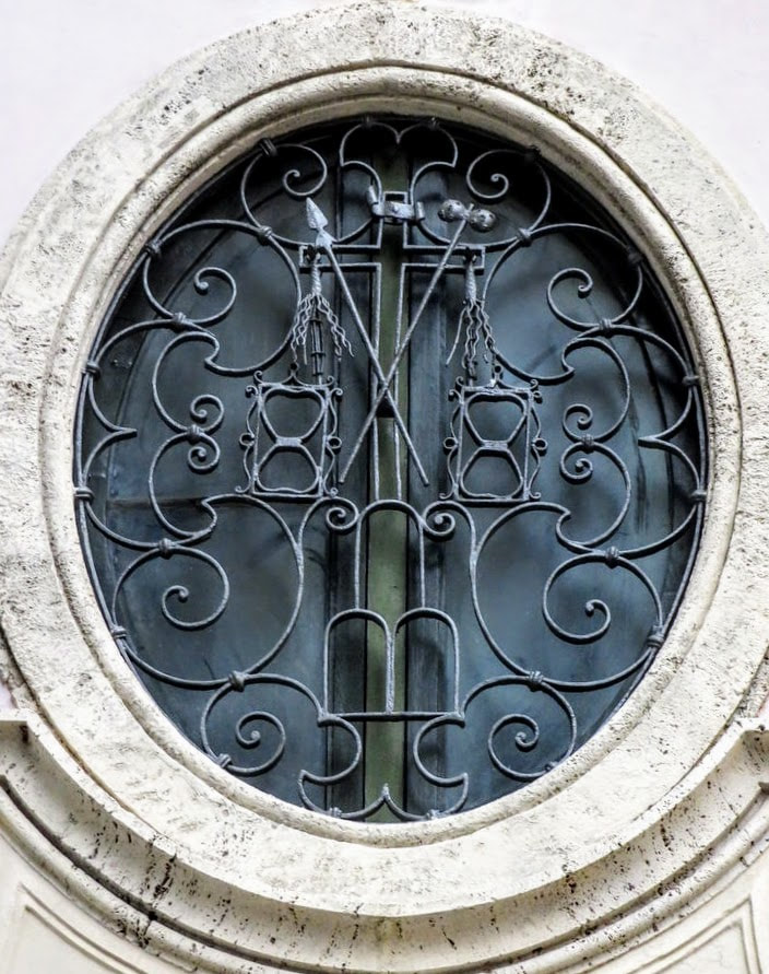 Window with wrought-iron decoration, church of Santa Maria dell' Orazione e Morte, Rome